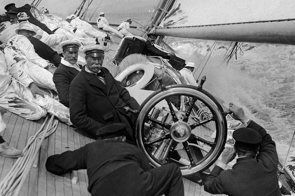 Thomas Lipton aboard one of his racing yachts. An avid sailor, the tea tycoon competed 5 times at the America's Cup and lost each challenge. The beloved yachtsman was later awarded with a special cup and declared 'greatest loser'.