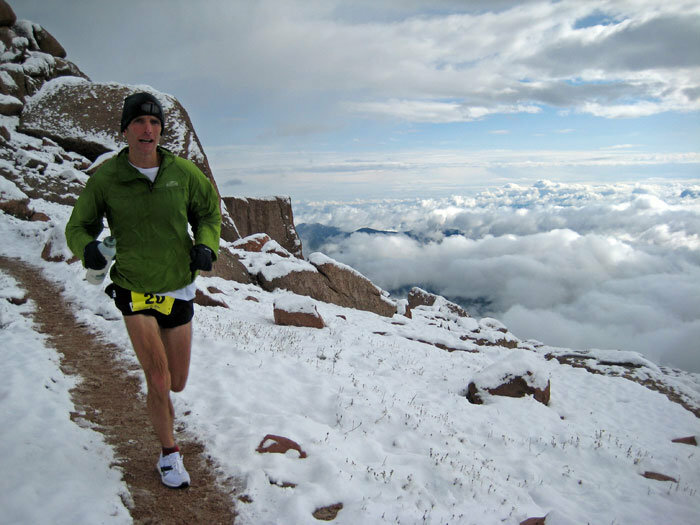 Matt Carpenter, 12-time champion of the Pike's Peak Marathon, making his way down from the 14,115-foot summit. Along with the Hill Climb car race, Pike's Peak has mixed sports with a pioneering spirit for over a century.